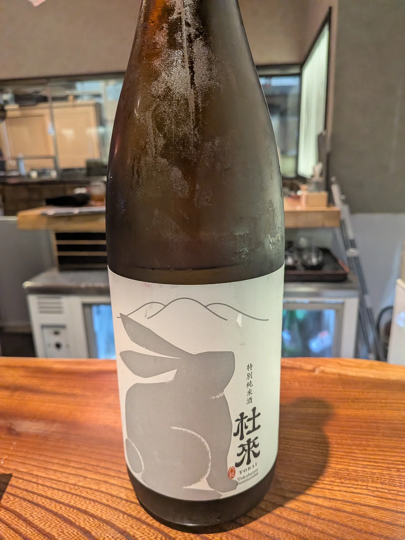Front label of Torai Tokubetsu Junmai at Aomoriya